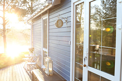 Sun coming around the outside of a house | Home Insurance